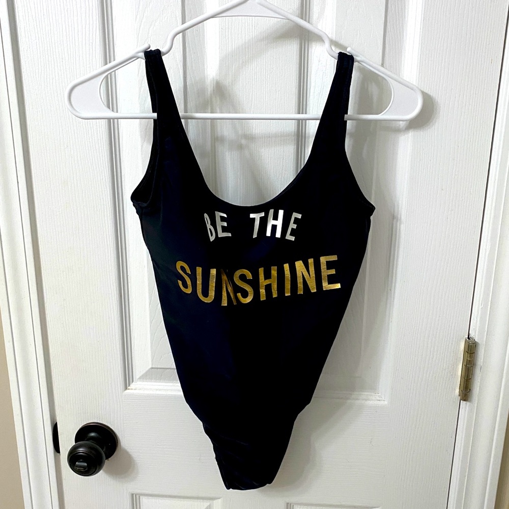 Black one piece with high hips
